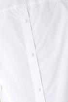 قميص قطن بوبلين بأزرار خلفية